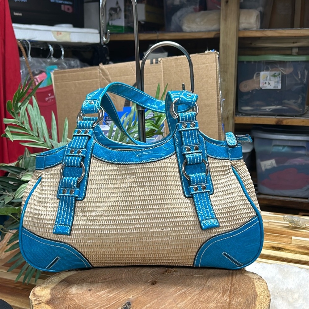 Tan woven and aqua‎ blue vinyl alligator patterned material